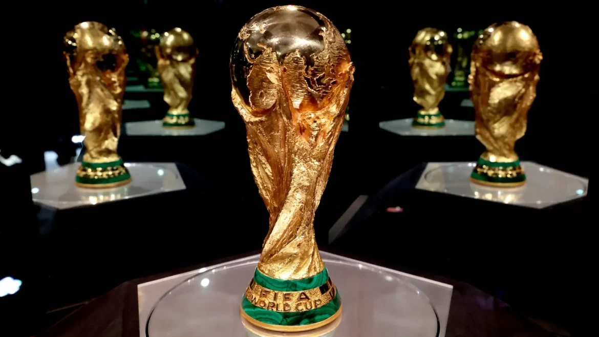 FIFA World Cup Trophy close-up showing gold surface and detailed craftsmanship