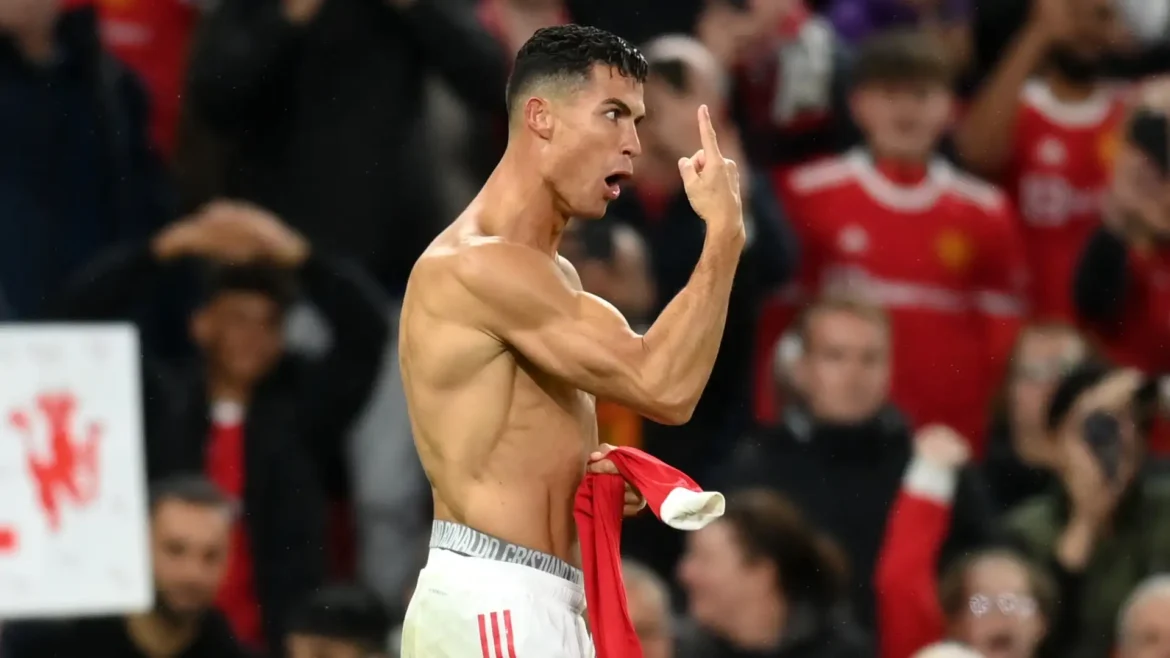 Cristiano Ronaldo celebrating a goal as the highest goal scorer in football history