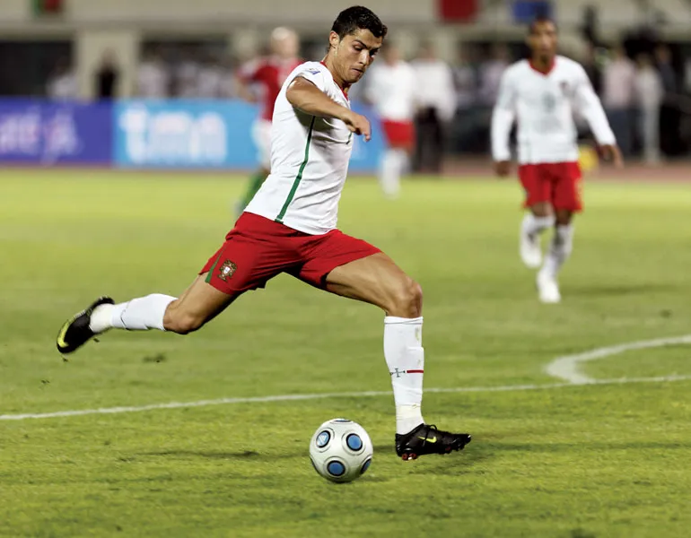 Cristiano Ronaldo playing during his early football career after he started playing soccer with Andorinha