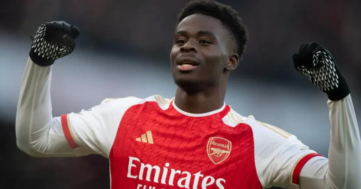 Bukayo Saka celebrating for Arsenal showing Saka salary per week £300,000 weekly wage in 2026 contract update